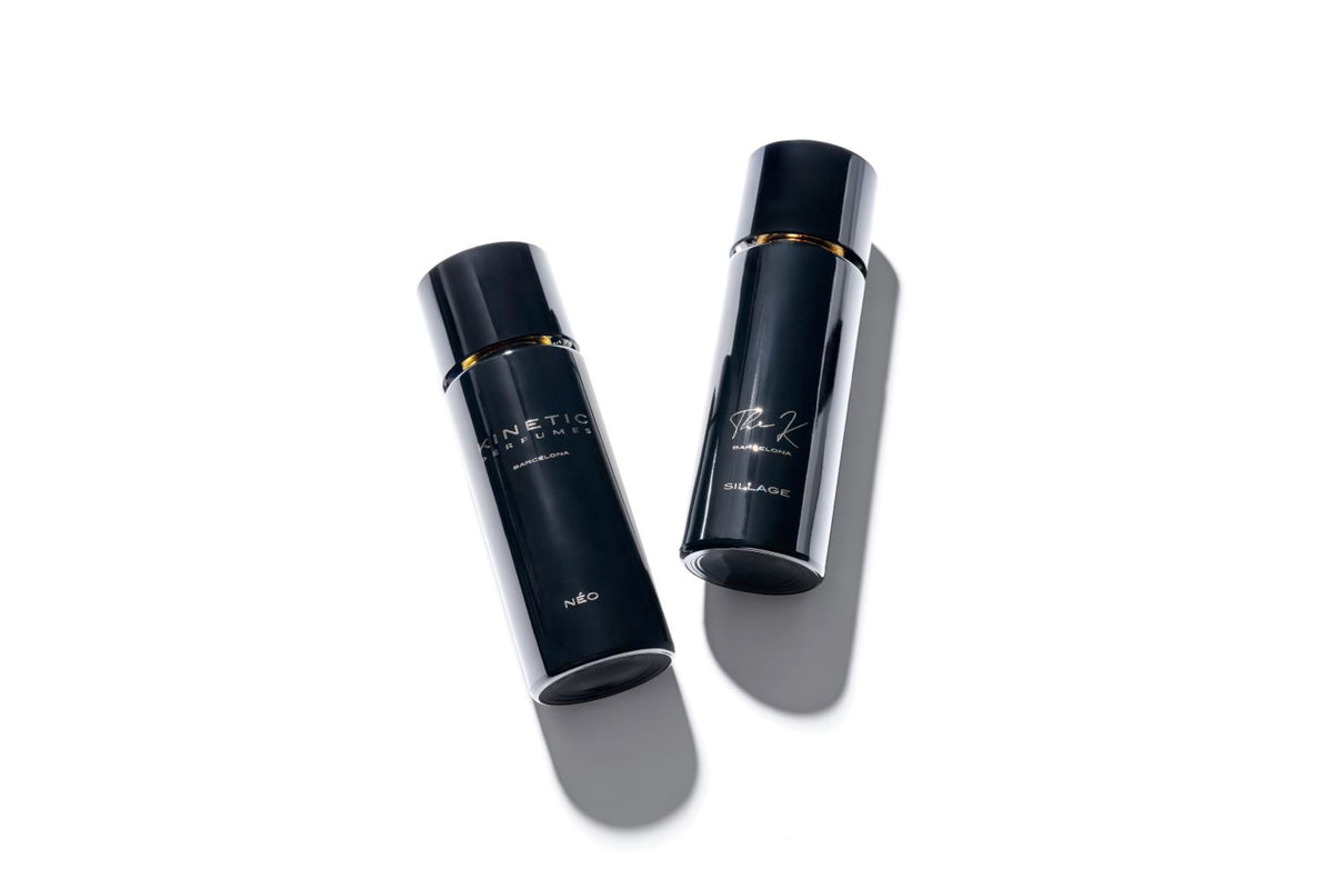 Kinetic Perfumes Néo Sillage Extrait de Parfum 100 ml – zwei schwarze Flakons nebeneinander liegend auf Weiss
