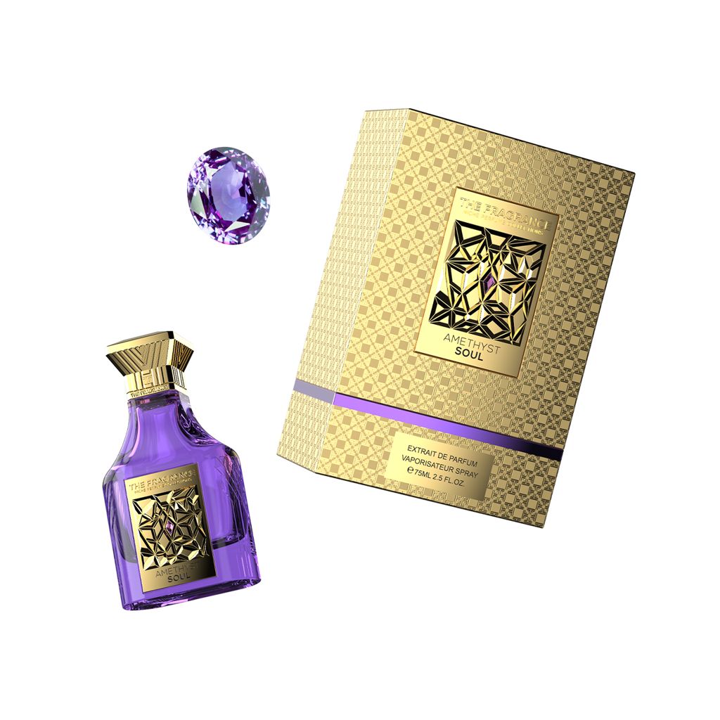 The Fragrance Amethyst Soul Extrait de Parfum 75 ml – violetter Flakon schräg neben violettem Amethyst und goldener Box