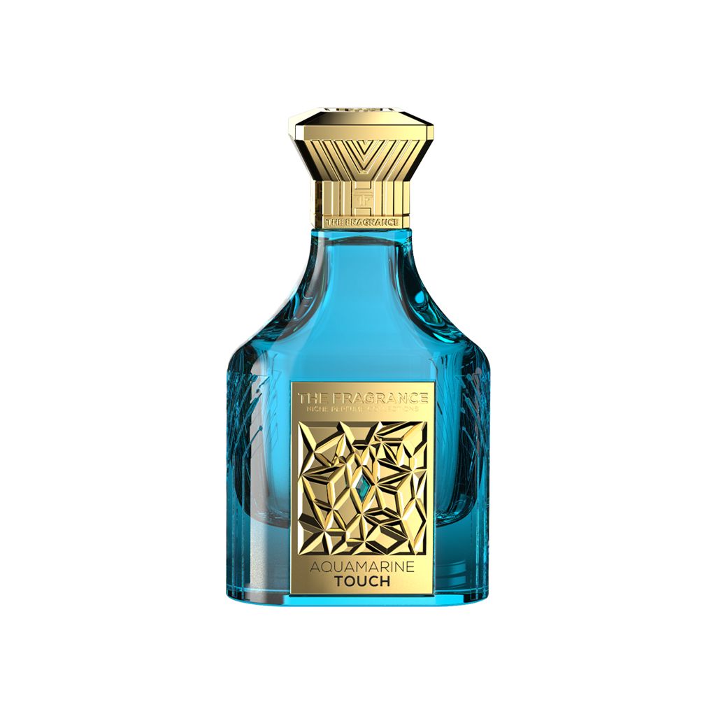 The Fragrance Aquamarine Touch Extrait de Parfum 75 ml – türkisfarbener Flakon mit goldener Plakette auf weissem Hintergrund