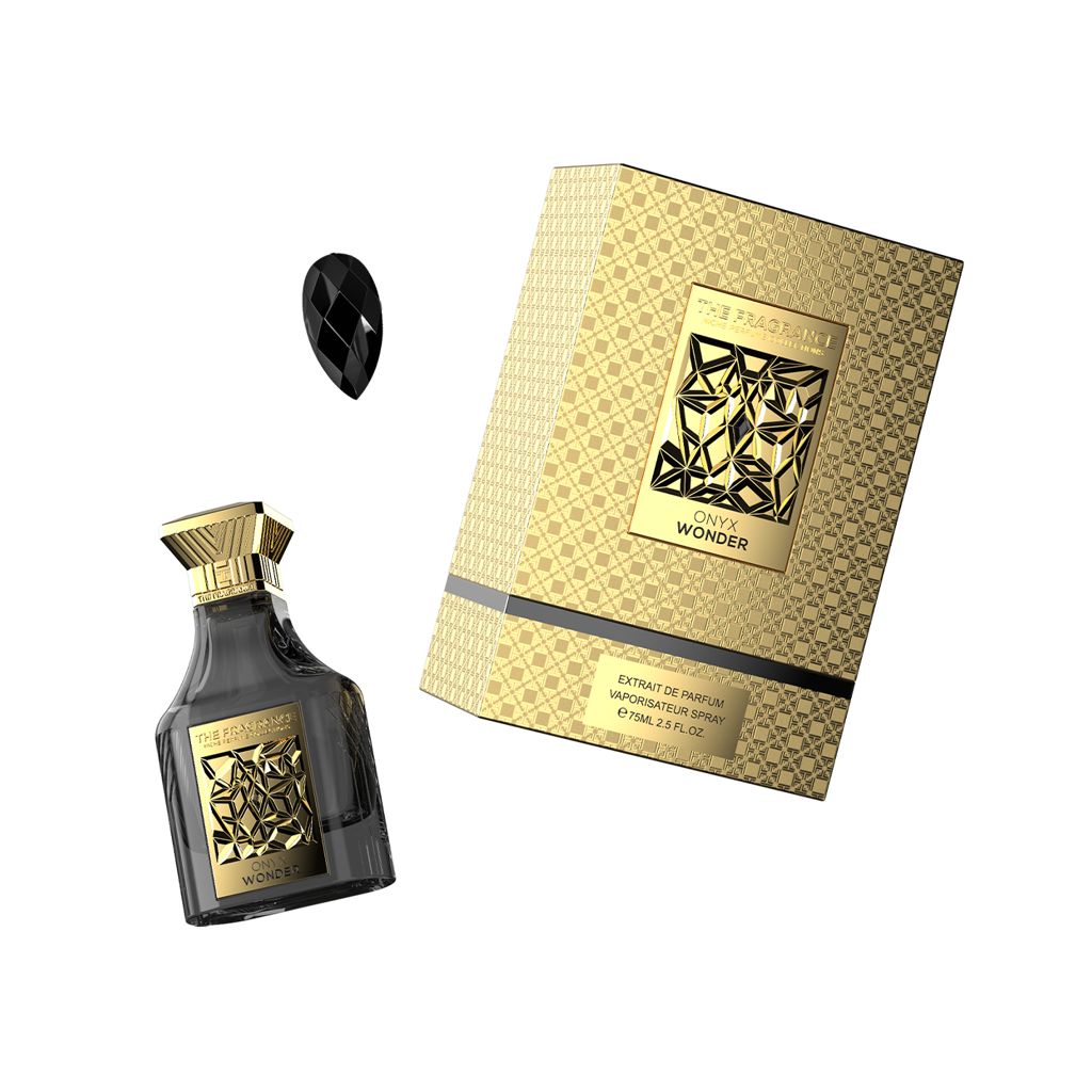 The Fragrance Onyx Wonder Extrait de Parfum 75 ml – schwarzer Flakon schräg neben schwarzem Onyx-Tropfen und goldener Box