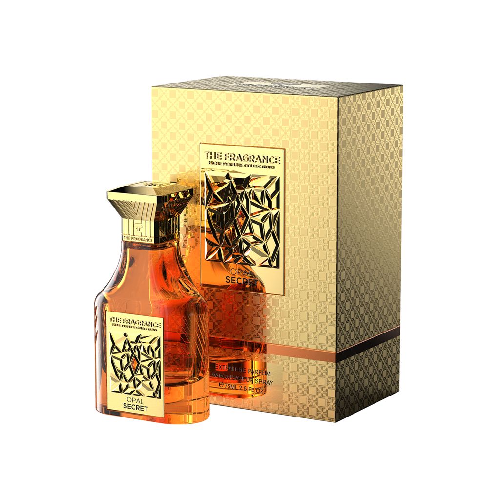The Fragrance Opal Secret Extrait de Parfum 75 ml – bernsteinfarbener Flakon vor goldener Geschenkbox mit orangem Streifen