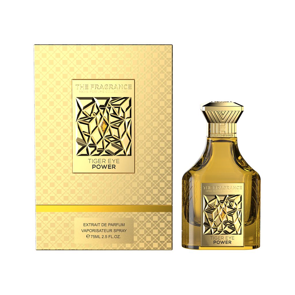 The Fragrance Tiger Eye Power Extrait de Parfum 75 ml – goldgelber Flakon rechts neben frontaler goldener Box mit goldenem Streifen