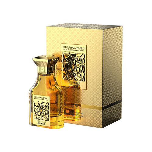 The Fragrance Tiger Eye Power Extrait de Parfum 75 ml – goldgelber Flakon vor goldener Geschenkbox mit goldenem Streifen