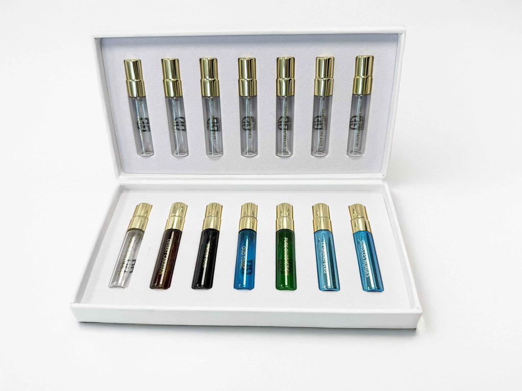 The Gate Discovery Set 14 × 5 ml – 14 Probierfläschchen mit goldenen Kappen in geöffneter weisser Box
