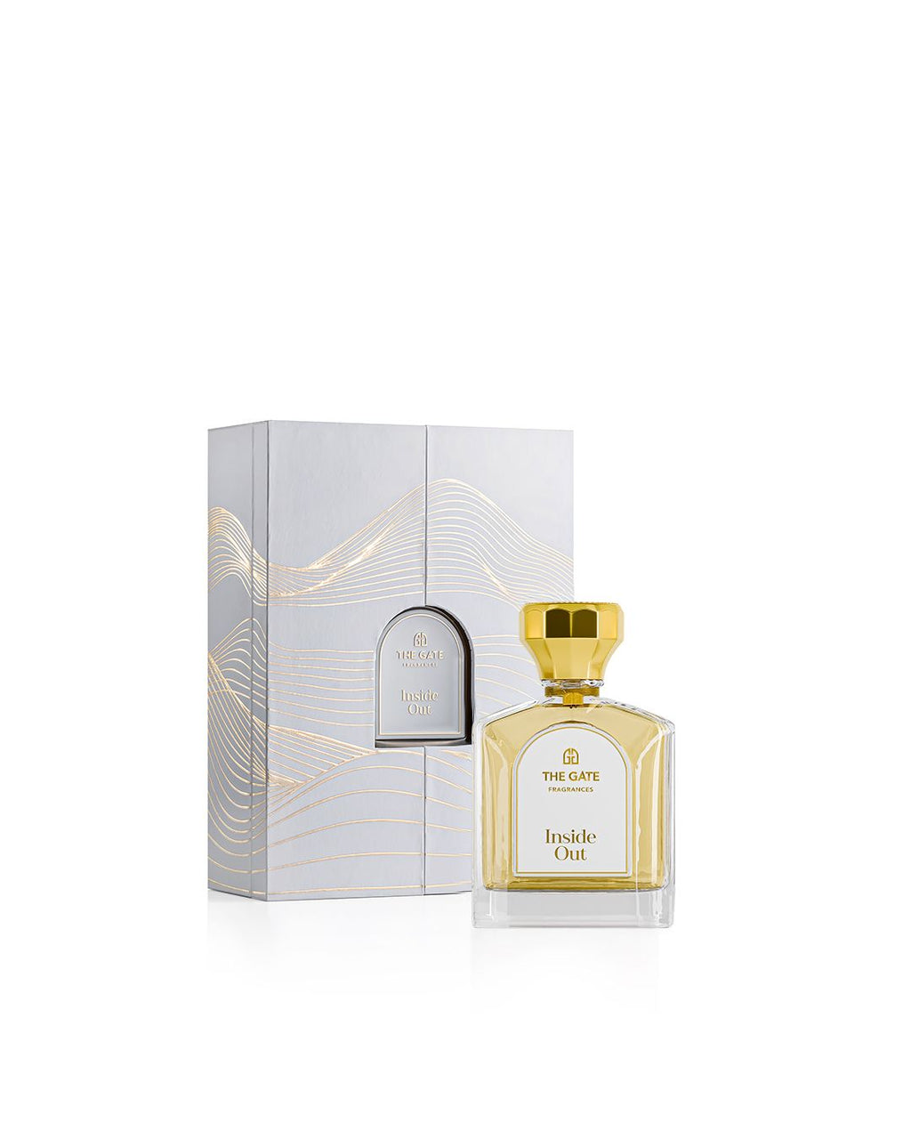 The Gate Inside Out Extrait de Parfum 100 ml – hellgoldener Flakon neben silberner Geschenkbox mit goldenen Wellenlinien
