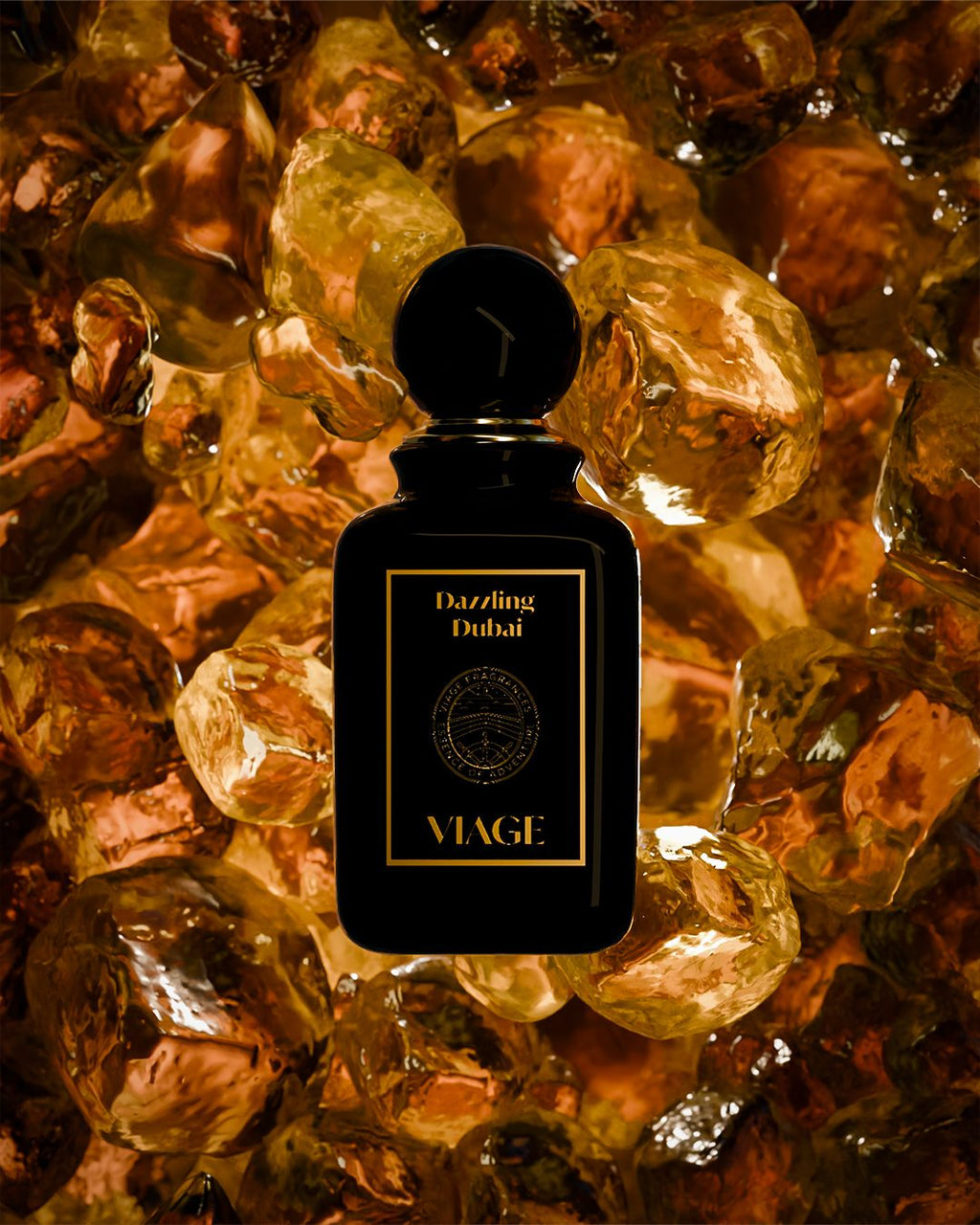 Viage Dazzling Dubai Extrait de Parfum 100 ml – Schwarzer Flakon mit goldener Schrift vor goldbraunen Bernsteinbrocken