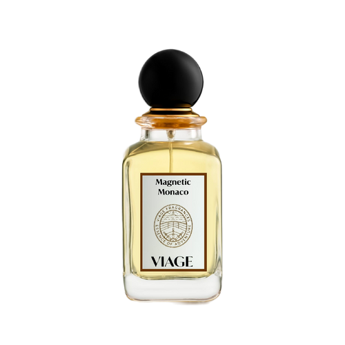 Viage Magnetic Monaco Extrait de Parfum 100 ml – Klarer Flakon, hellgoldener Duft, schwarze Kugelkappe, weisses Etikett, weisser Hintergrund
